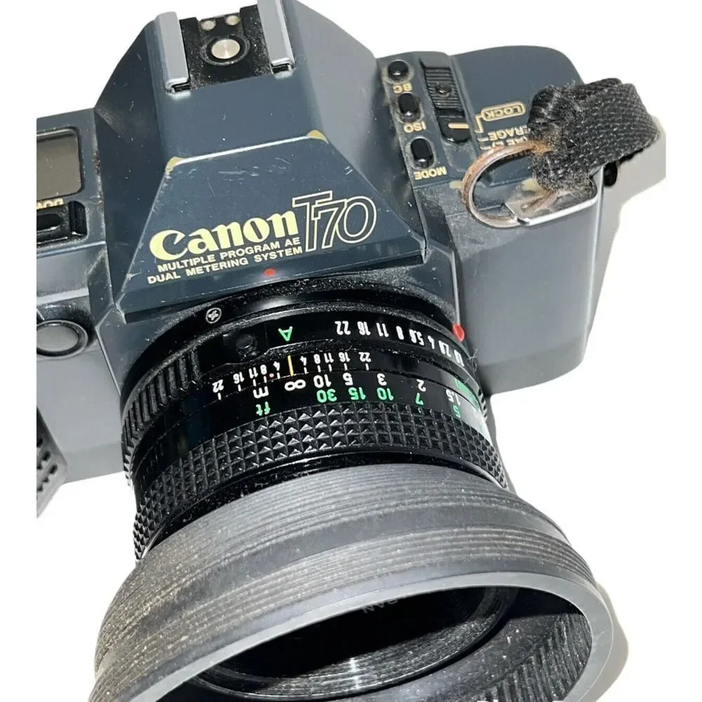 Canon T70 Multiple Program AE W/ 50mm Canon Lens / Untested With Bag & Strap